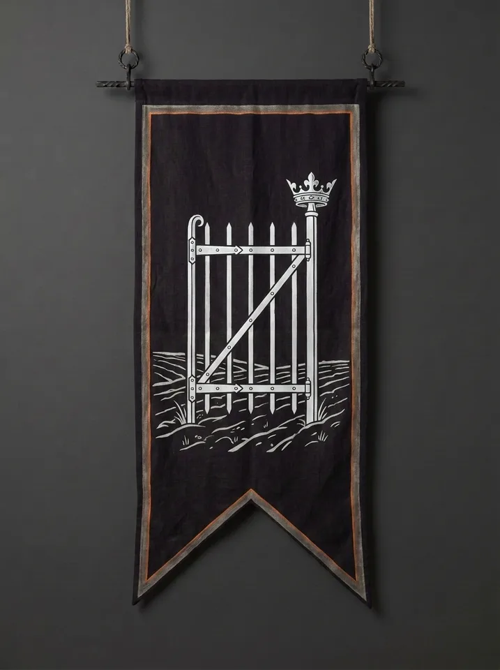 The banner of Naskarre: A tall iron field gate standing by itself in bare fallow ground, its hinges newly forged and bright, a polished coronet finial on the gatepost.